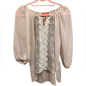 Live to be Spoiled. Cream colored Lace/detailed design on front of blouse